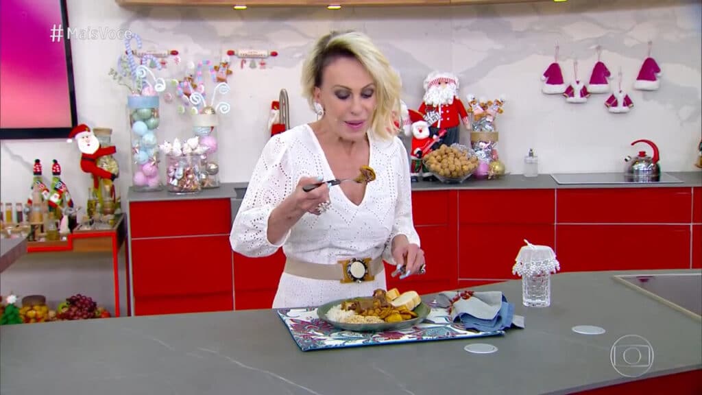Imagem com foto da apresentadora Ana Maria Braga comendo rabo barreado