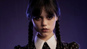 Imagem com foto da atriz Jenna Ortega em poster da série Wandinha, da Netflix