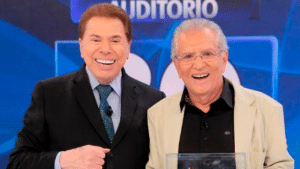 Imagem com foto dos apresentadores Silvio Santos e Carlos Alberto de Nóbrega
