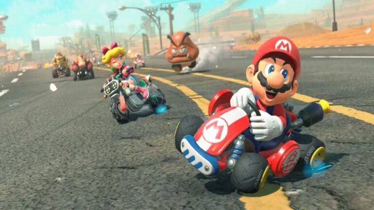 Personagens Mario e Princesa Peach competem em corrida de karts e motos coloridos em pista asfaltada no jogo Mario Kart
