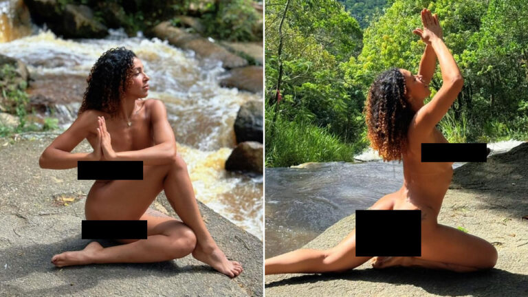 Emelly Souza nua com tarjas faz poses de ioga sobre pedras de cachoeira cercada por mata verde e água corrente em dia ensolarado