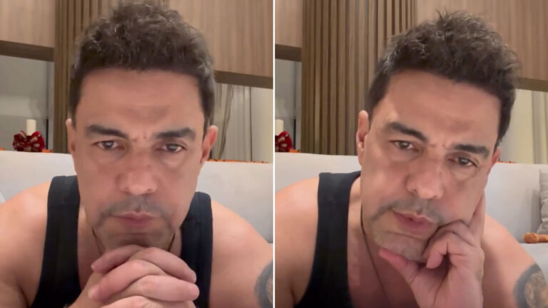 Zezé Di Camargo encara a câmera com expressão séria usando regata preta e mãos apoiadas no queixo em vídeo nas redes sociais