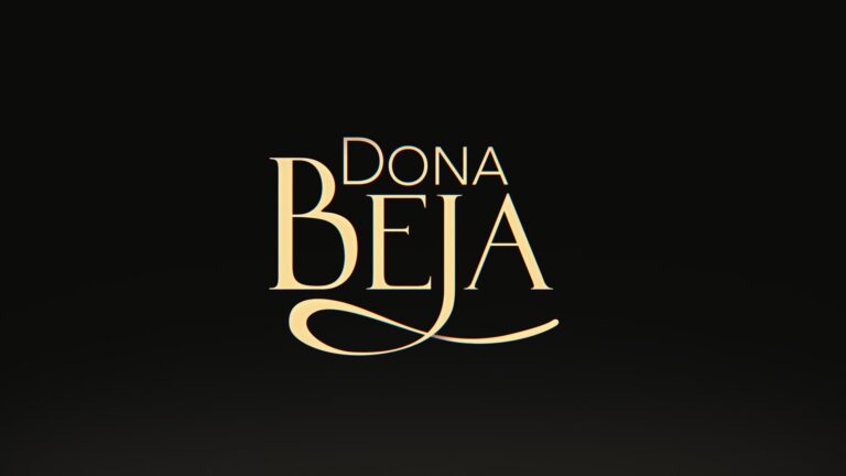 Logotipo da novela Dona Beja em letras douradas e elegantes com serifa, destacando a letra B alongada, centralizado sobre um fundo preto sólido