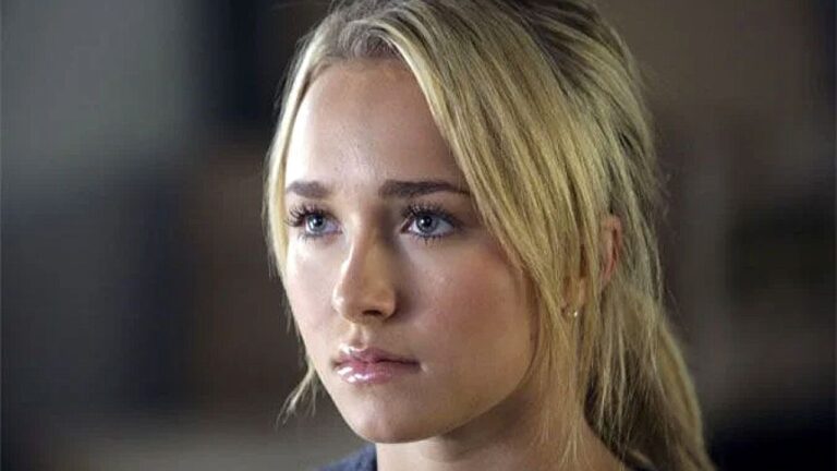 Hayden Panettiere com expressão séria em close durante cena de série dramática