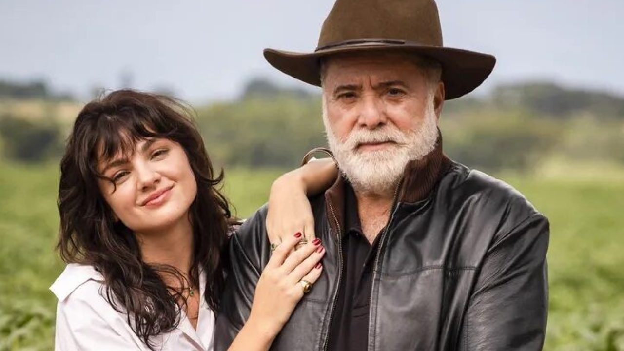 Foto de Terra e Paixão, com a atriz Debora Ozório ao lado de Tony Ramos