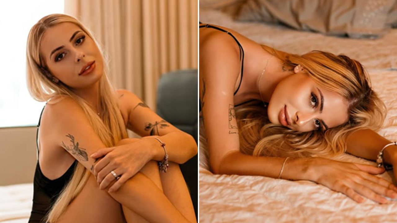 Gabriely Della Colleta em ensaio fotográfico posa sentada abraçando as pernas e deitada sobre a cama com olhar para a câmera