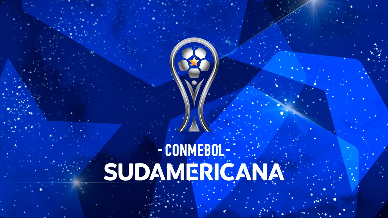 Taça estilizada da Copa Sul-Americana da Conmebol sobre fundo azul estrelado com o texto Conmebol Sudamericana em branco