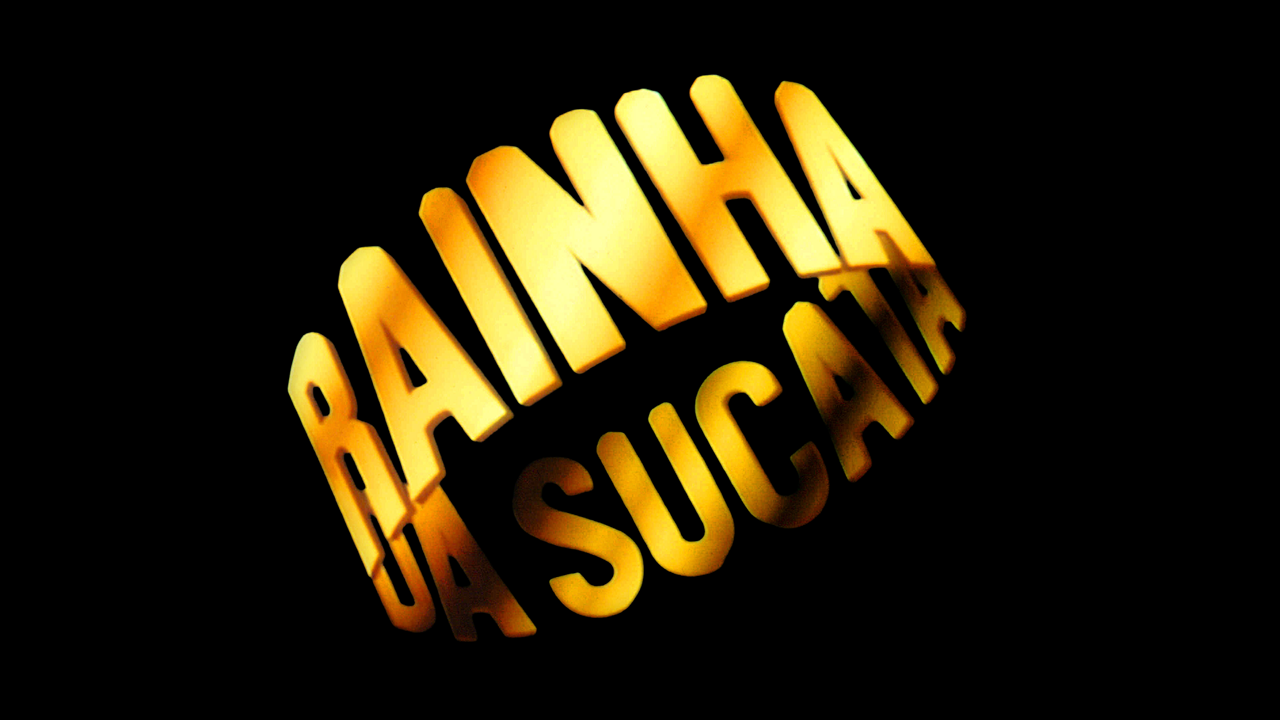 Logotipo da novela Rainha da Sucata com o título em letras maiúsculas douradas formando um círculo sobre um fundo totalmente preto